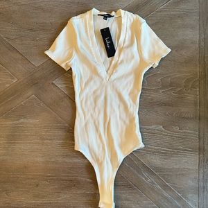 NWT Lulu’s Cream Ribbed Bodysuit